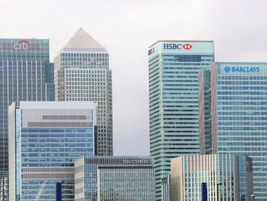 Illustration of tall buildings named citi, HSBC, Barclays