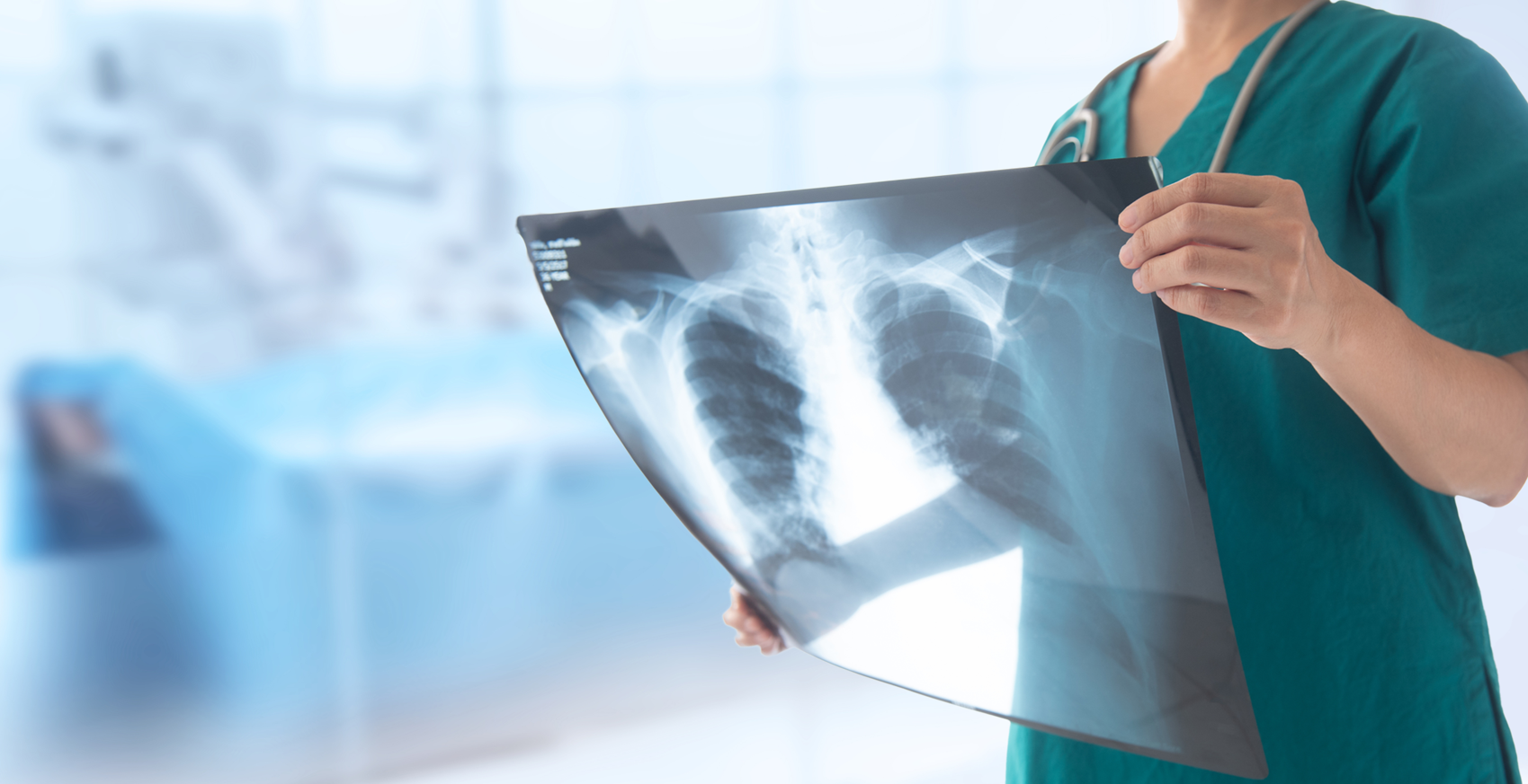 Medical professional checking an Xray result