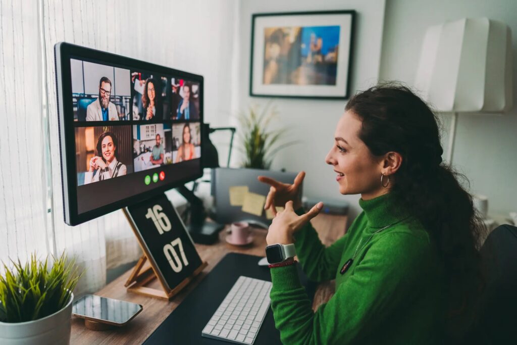 Woman working from home on a team video call