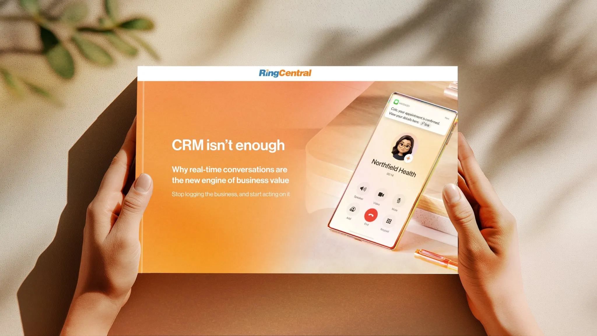 RingCentral enterprise playbook cover for "CRM isn't enough" being held by a person