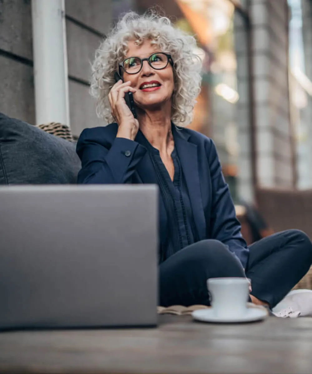 A woman engaged in a VoIP call