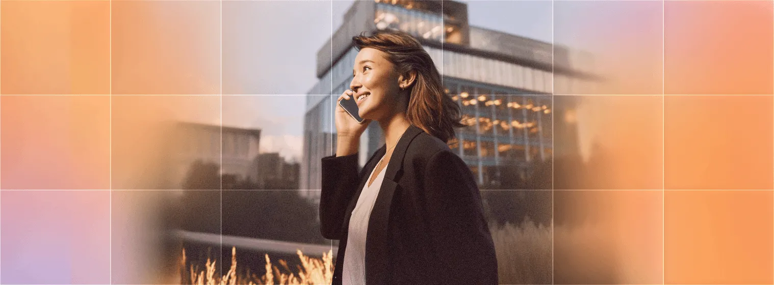 A professional woman smiling during a seamless AI-powered voice call.