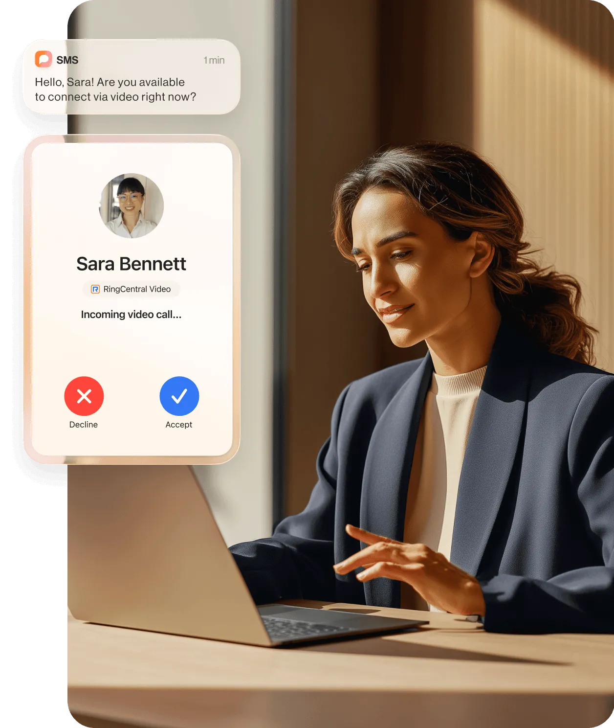 A woman holding a tablet while talking to a colleague using the RingCentral app