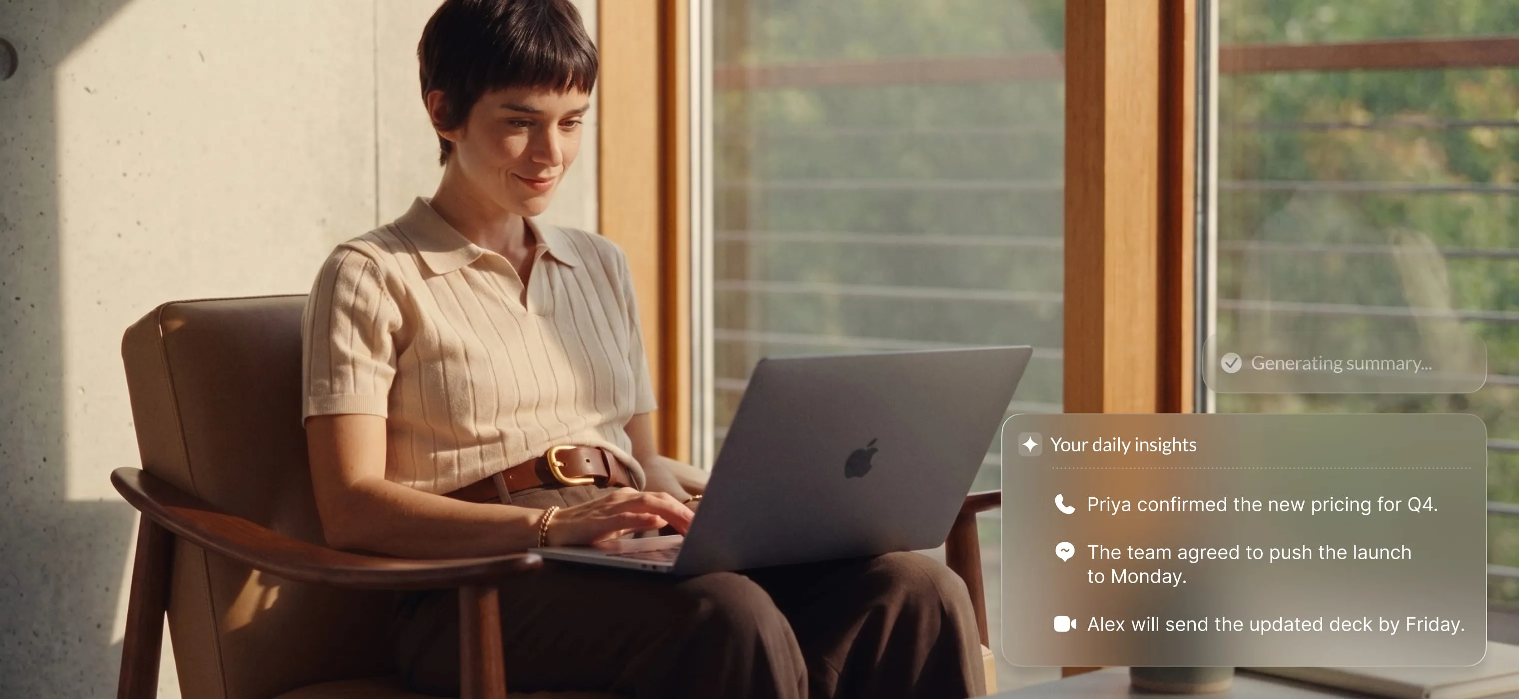 Professional woman using a laptop to review team insights, including pricing and project updates, through RingCentral.