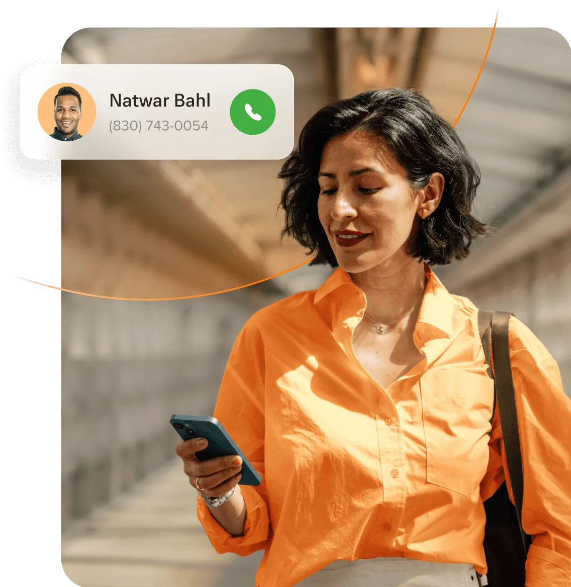 A woman looks at an incoming call in her RingCentral mobile app