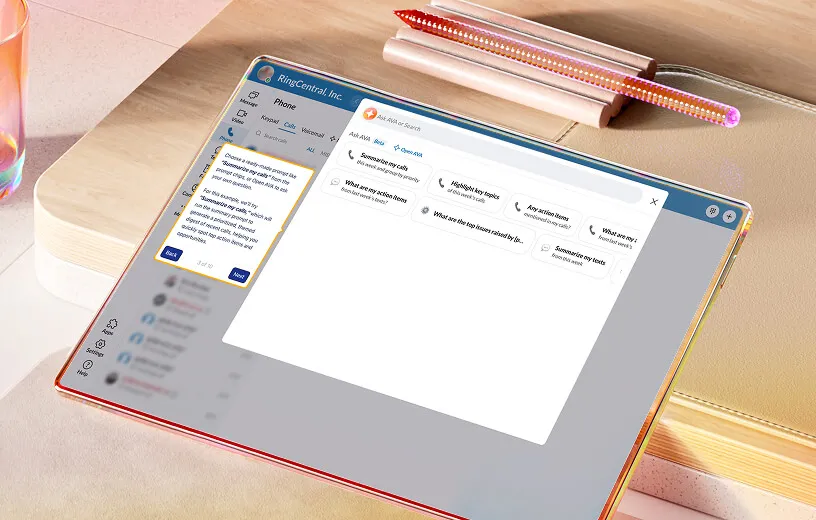 RingCentral app on a tablet showing the phone feature with AI assistant suggestions in a modern workspace.