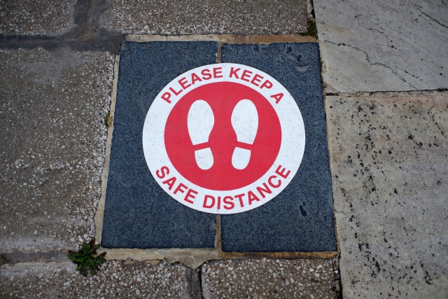 Please keep a safe distance sign uk public sector