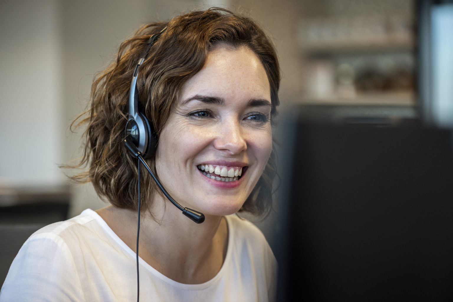 Customer service representative wearing headset in the office-837