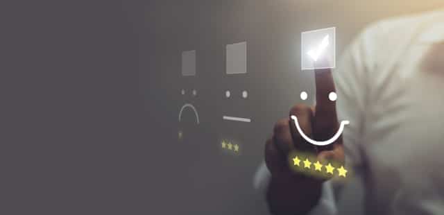 Man pressing smiley face emoticon on virtual touch screen | RingCentral UK