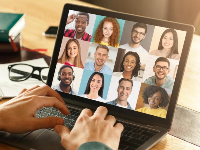Unrecognizable Man Making Video Chat On Laptop With Diverse Multiethnic Colleagues-655