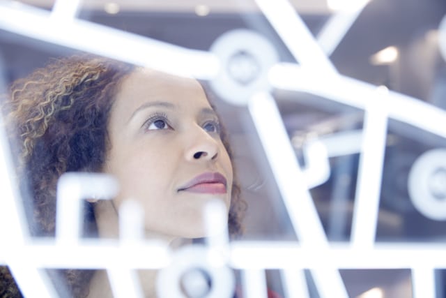 Portrait of woman operating digital interface technology-765