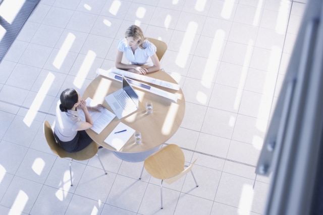 Businesswomen having meeting in lobby-572