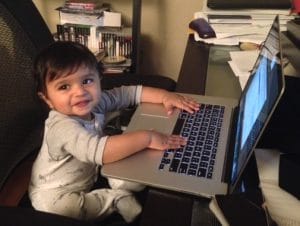 Baby Ved, working on his typing skills.