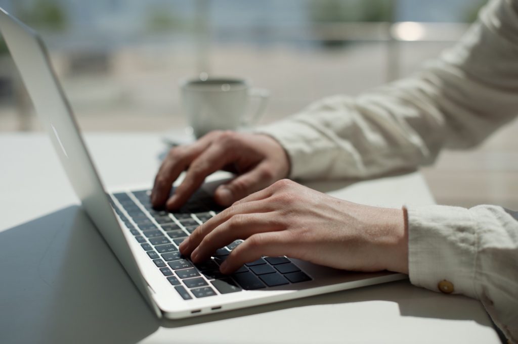 businessman-laptop-typing-tech-using-laptop-using-technology-people-using-laptop