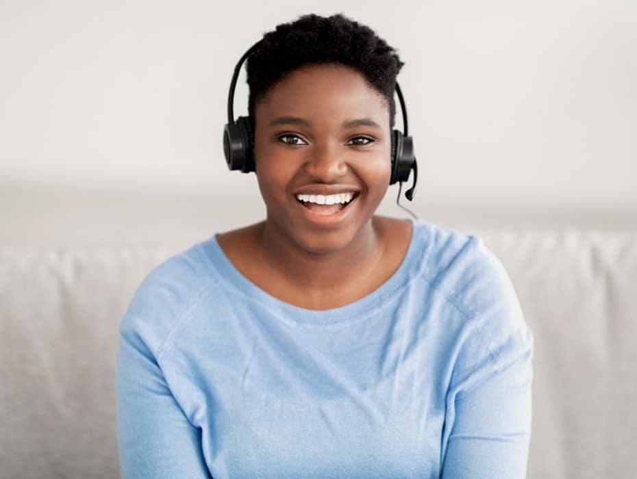 Smiling woman with a headset
