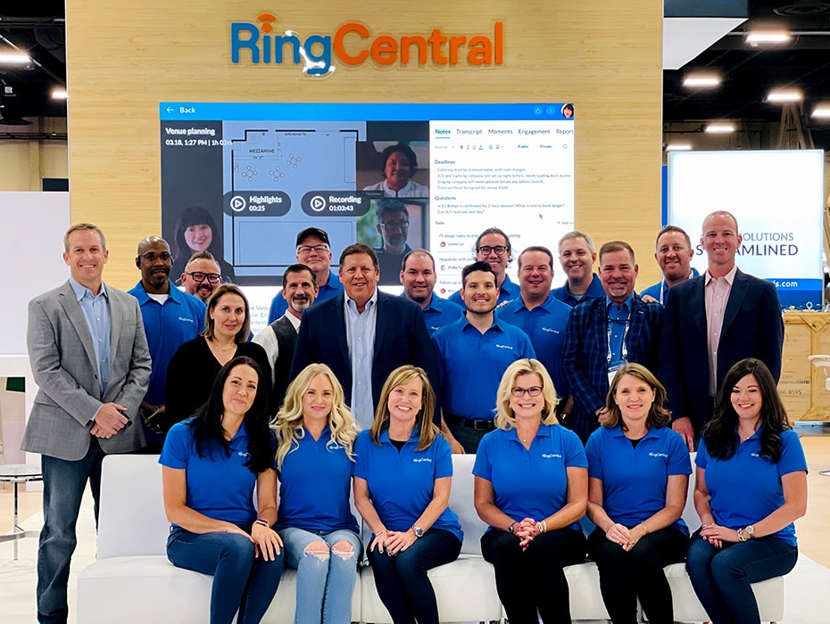 RingCentral staff posing for a group picture at a trade show