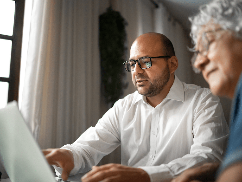 Woman and man getting help online for financial services matters