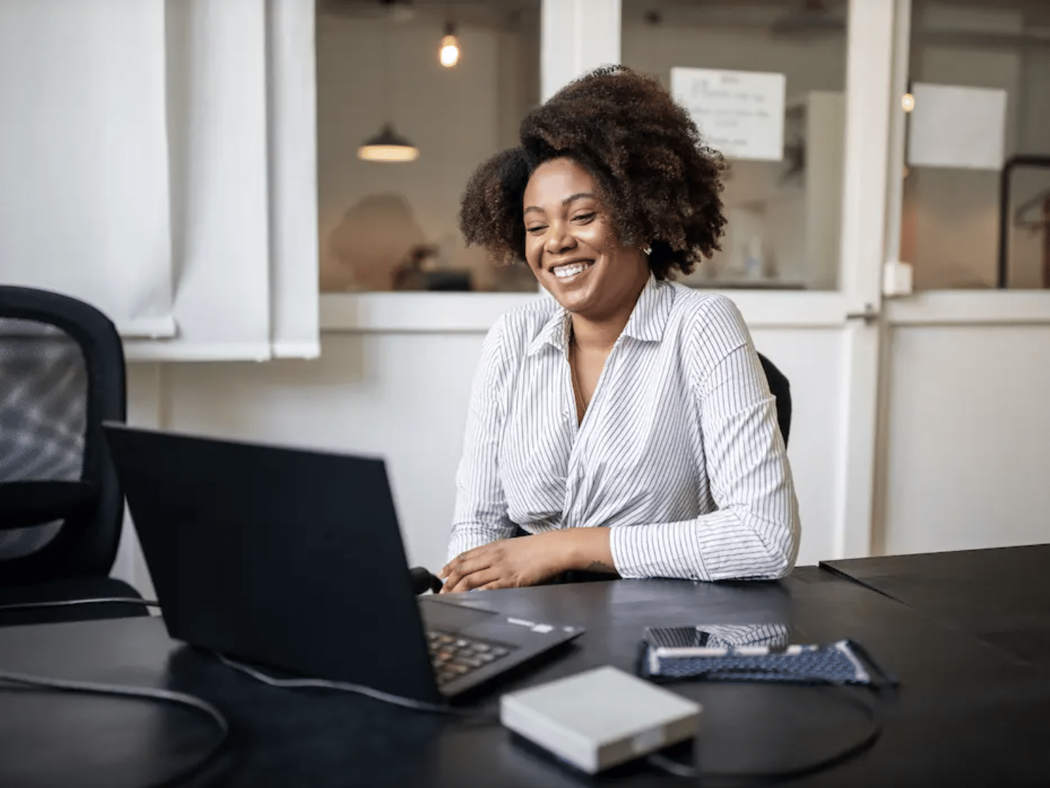 African-American businesswoman leverages cloud communications