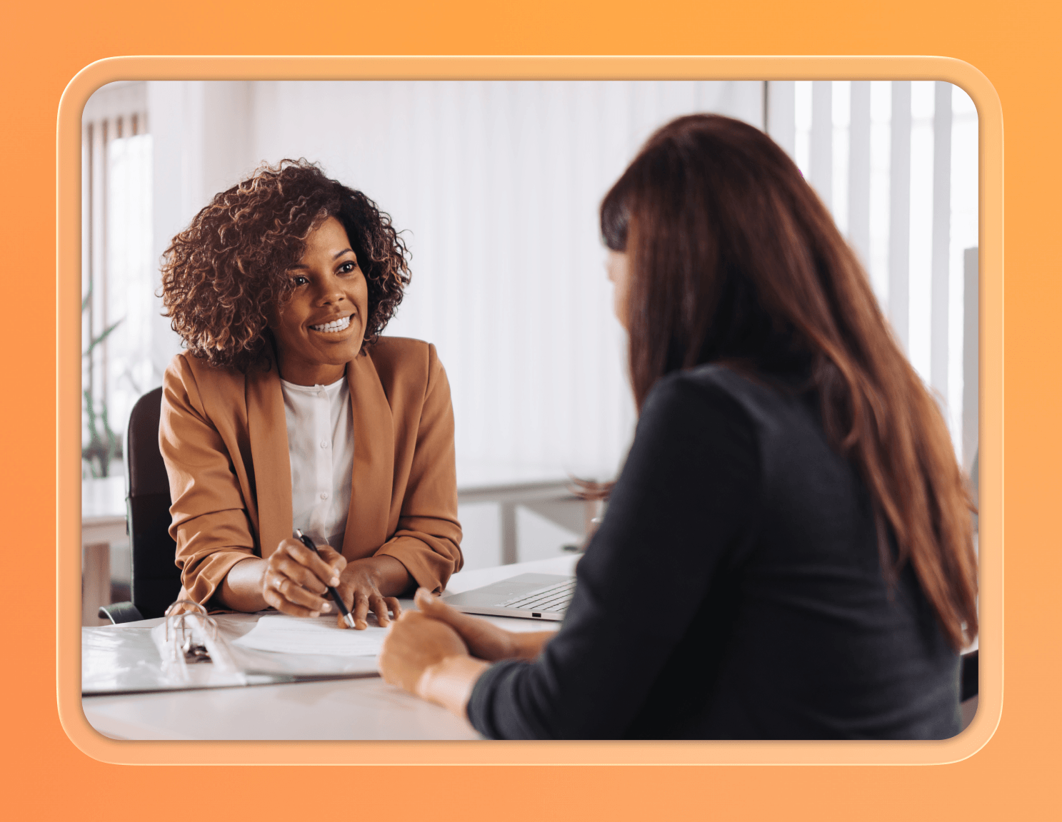 A bank manager assisting a customer.