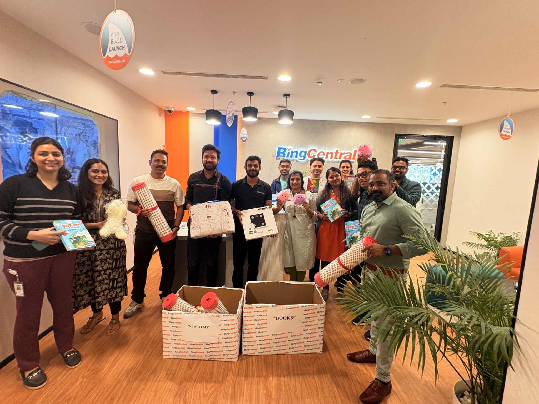 RingCentral India employees exchanging gifts in the office