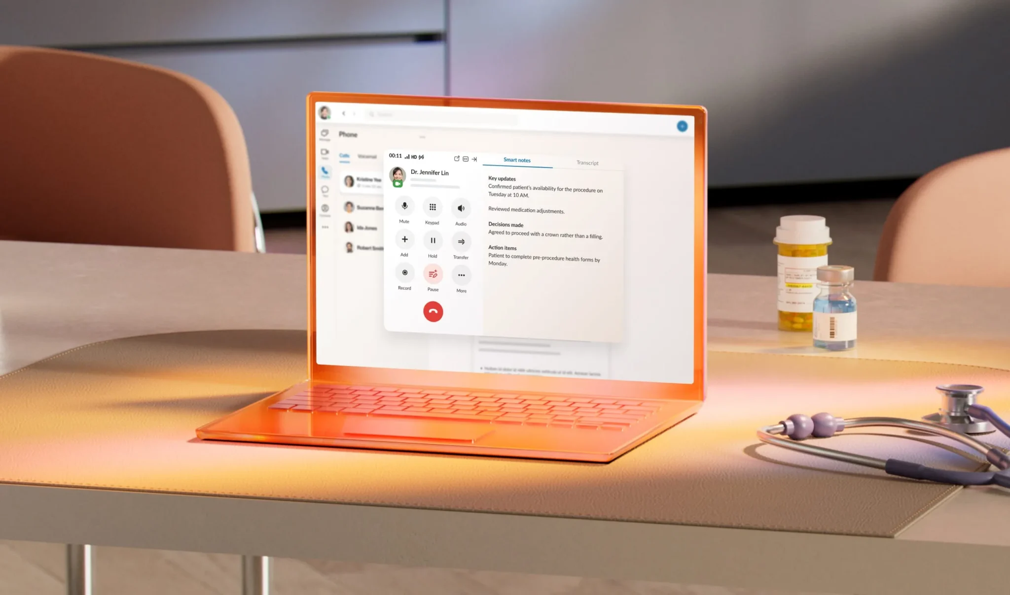 Laptop displaying healthcare call center software with live call controls on a desk beside prescription bottles and a stethoscope