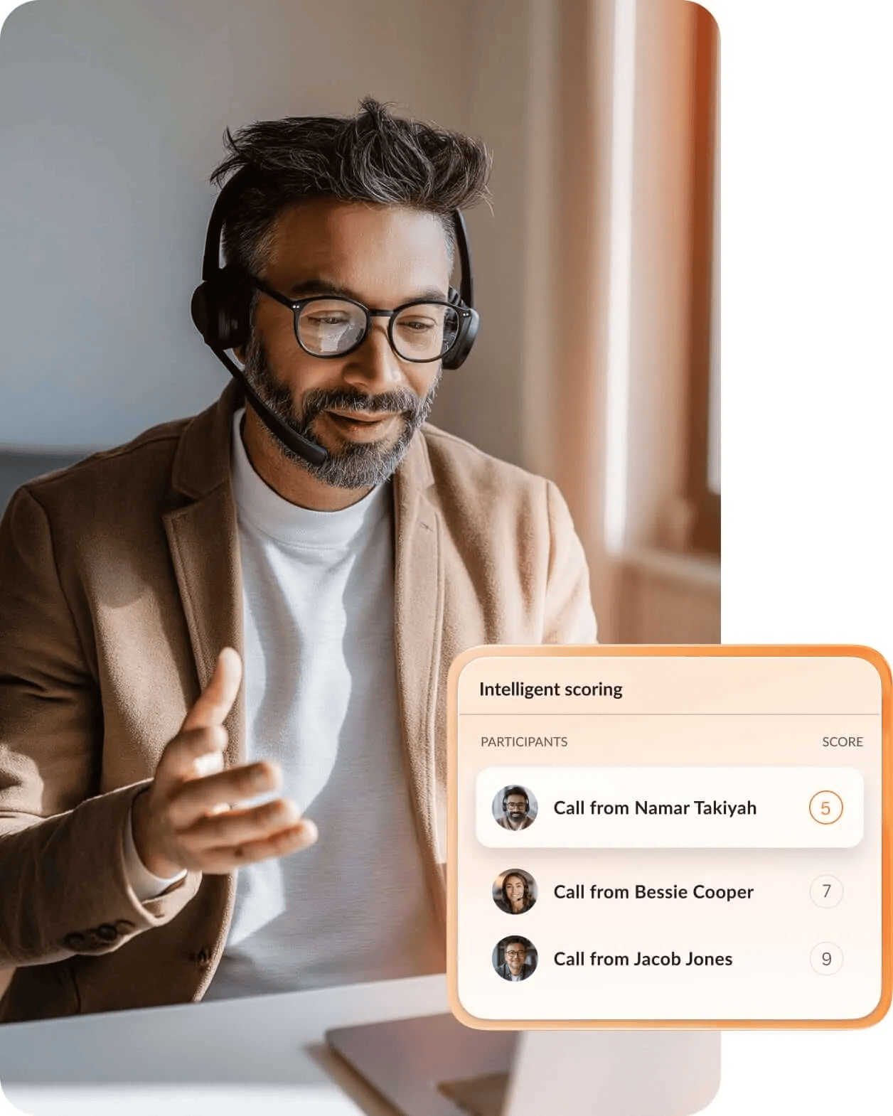 A man wearing a headset takes a customer call while the AI scores his conversation