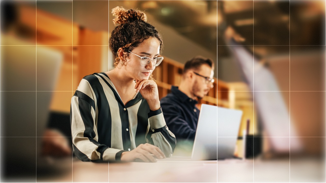 Woman on computer in computer lab