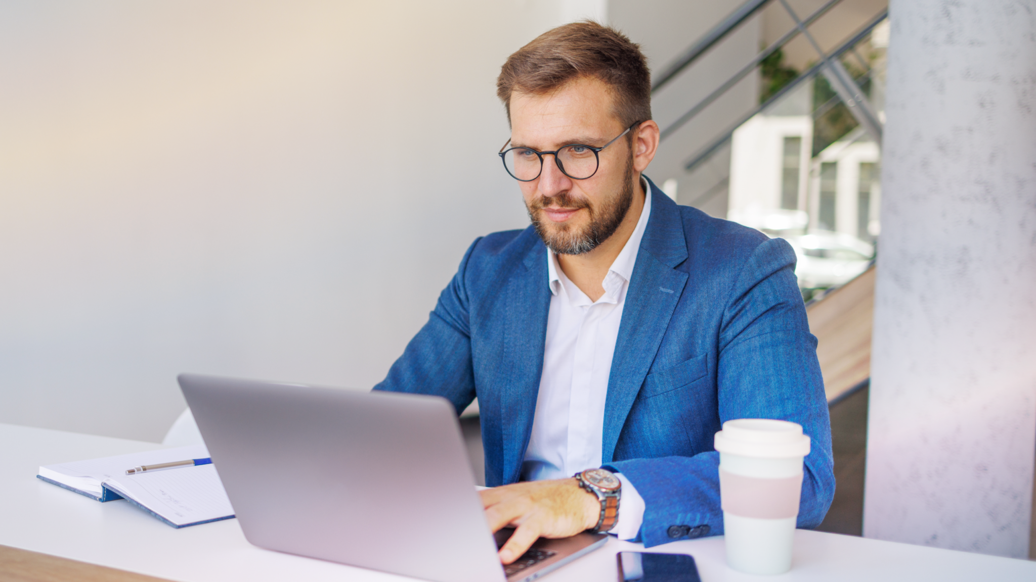 Contact center supervisor using RingCX AI Quality Management feature for customer service analytics