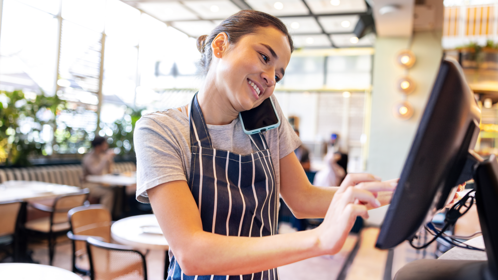 Franchise store employee using RingEX to manage multi-location calls and streamline customer support